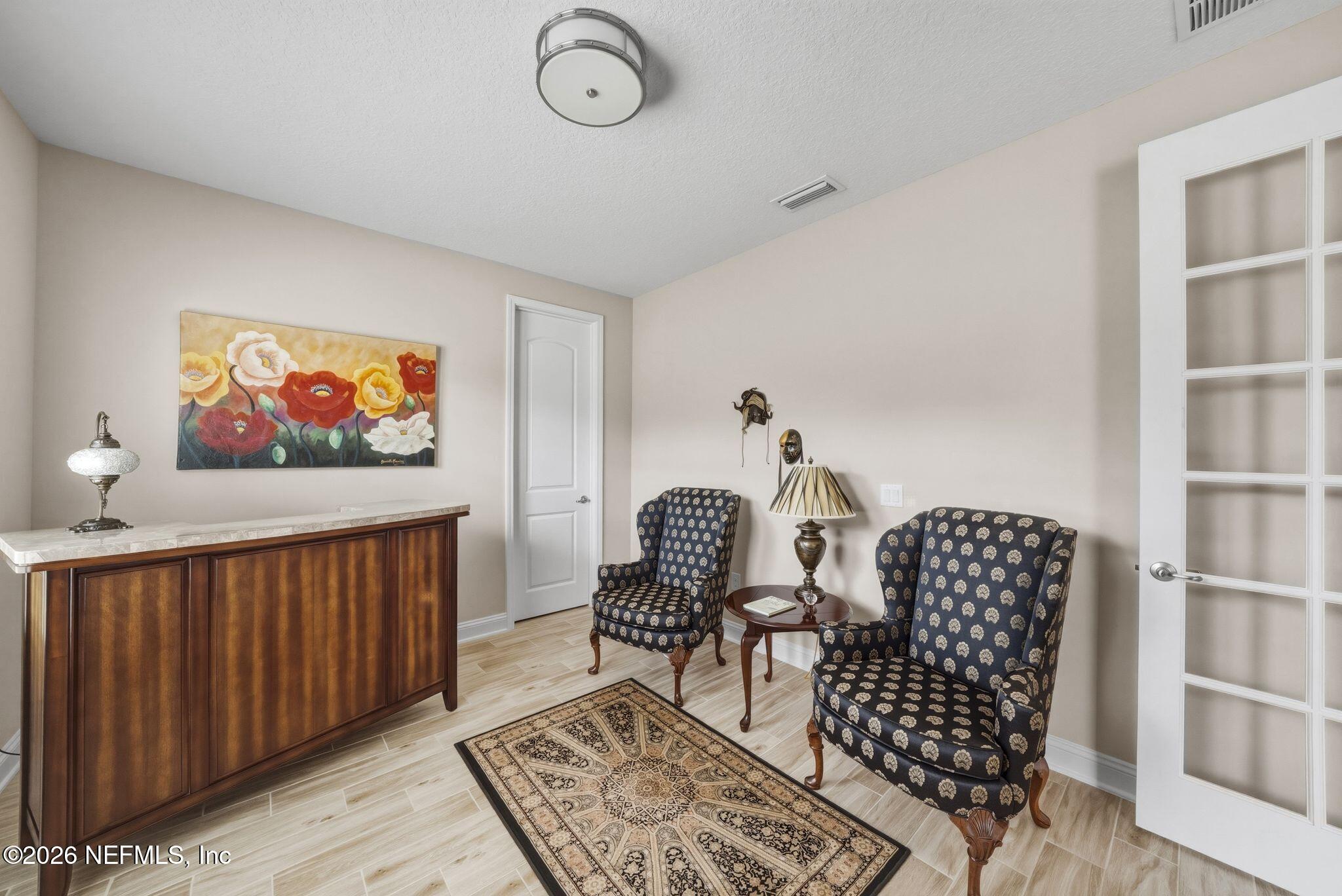 334 Athens Drive St. Augustine, FL 32092 - Photo 23 of 57 a living room with furniture