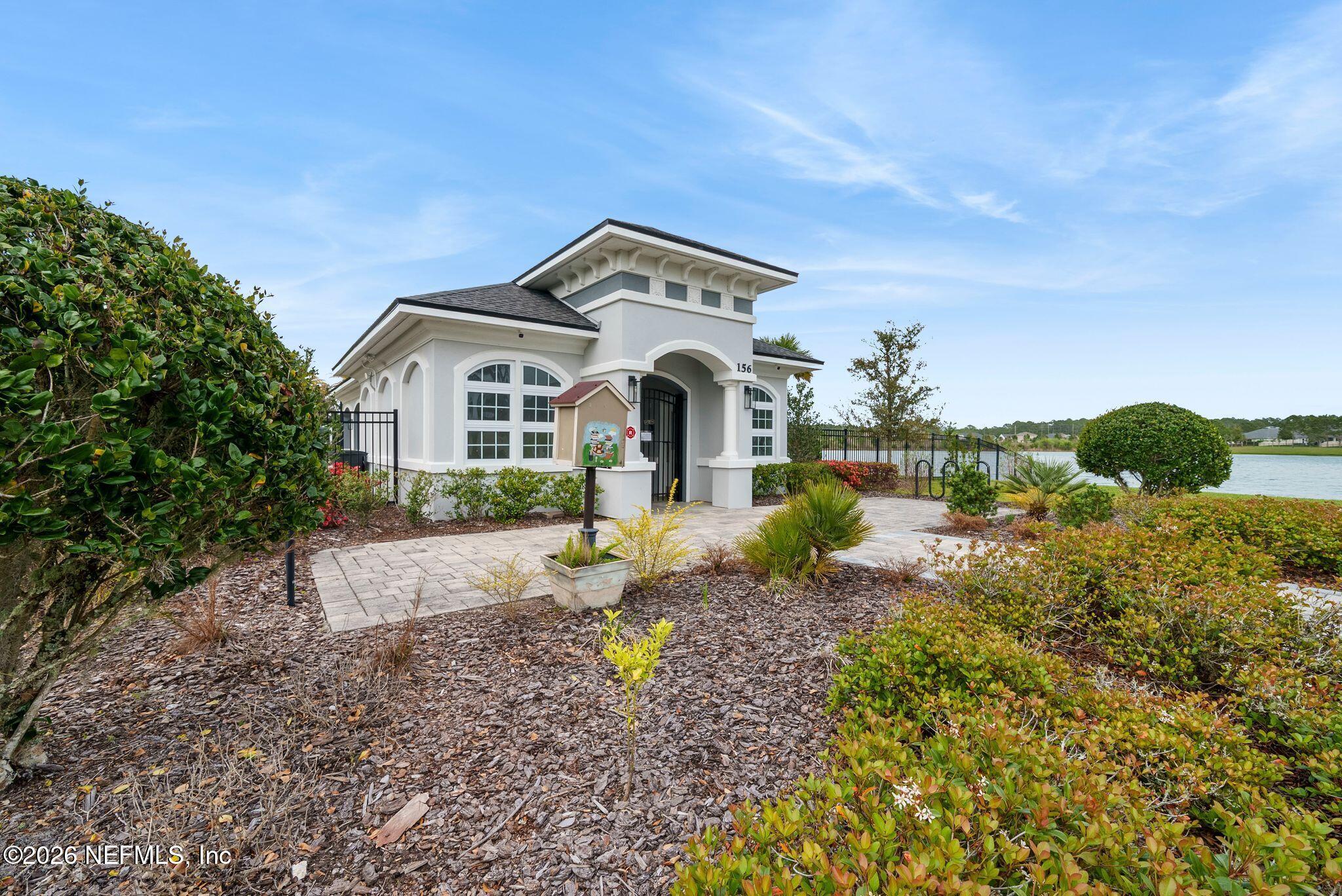 334 Athens Drive St. Augustine, FL 32092 - Photo 38 of 57 a front view of a house with garden