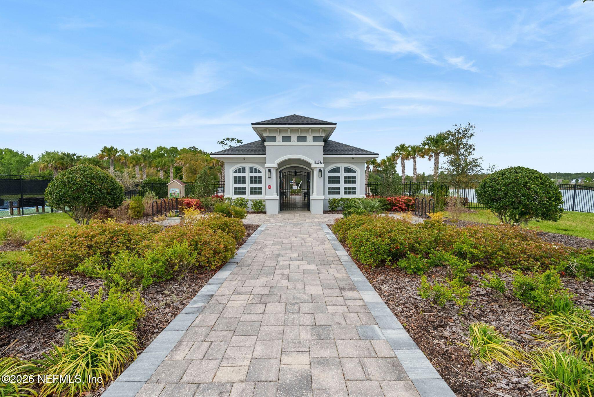 334 Athens Drive St. Augustine, FL 32092 - Photo 40 of 57 a front view of a house with a yard