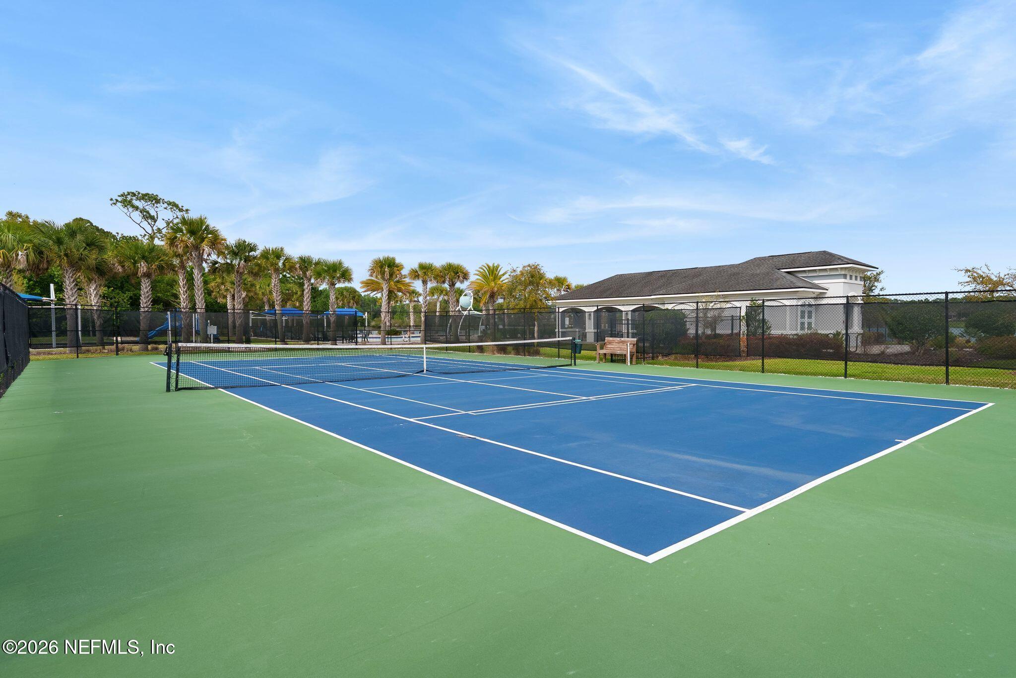 334 Athens Drive St. Augustine, FL 32092 - Photo 45 of 57 a view of an outdoor space and tennis court