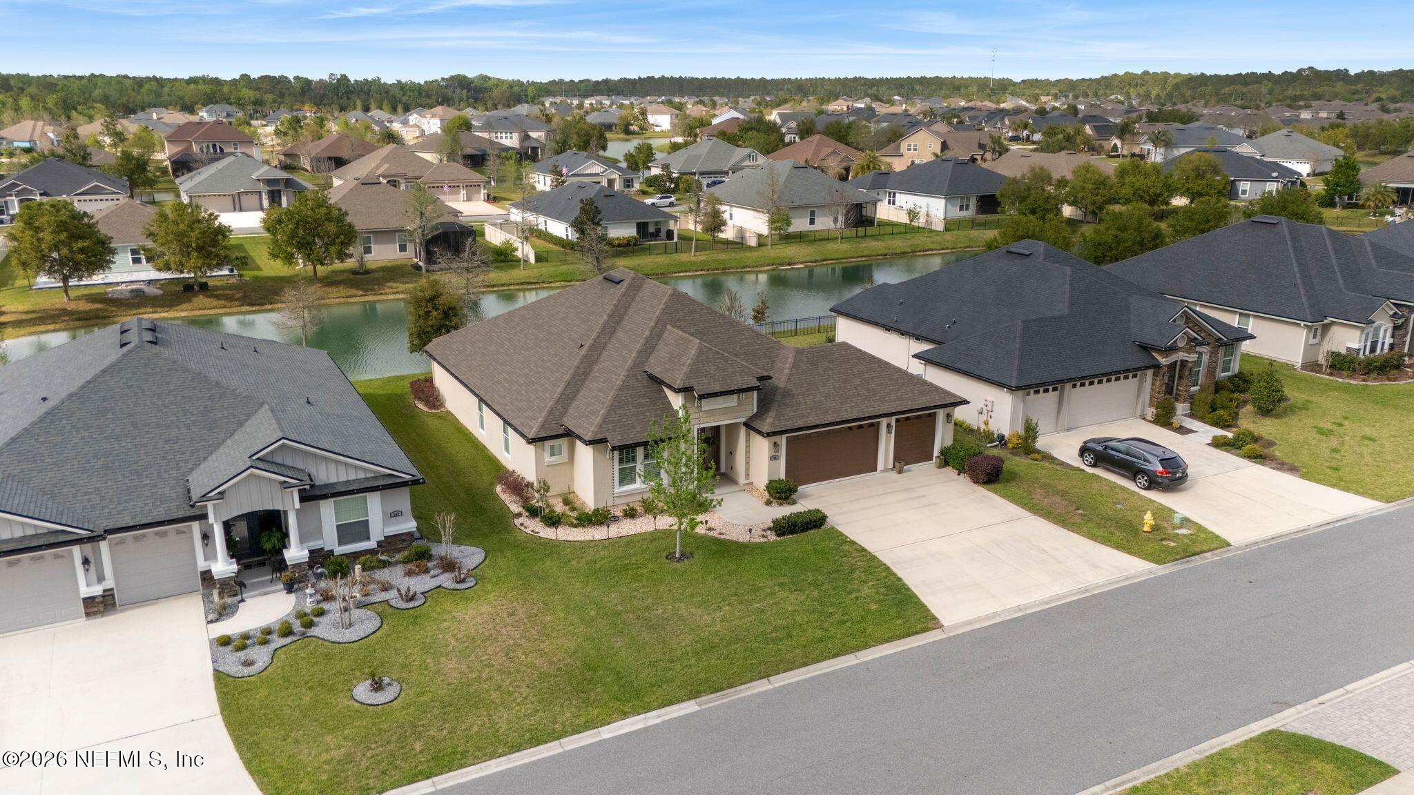 334 Athens Drive St. Augustine, FL 32092 - Photo 46 of 57 an aerial view of residential houses with outdoor space and city view