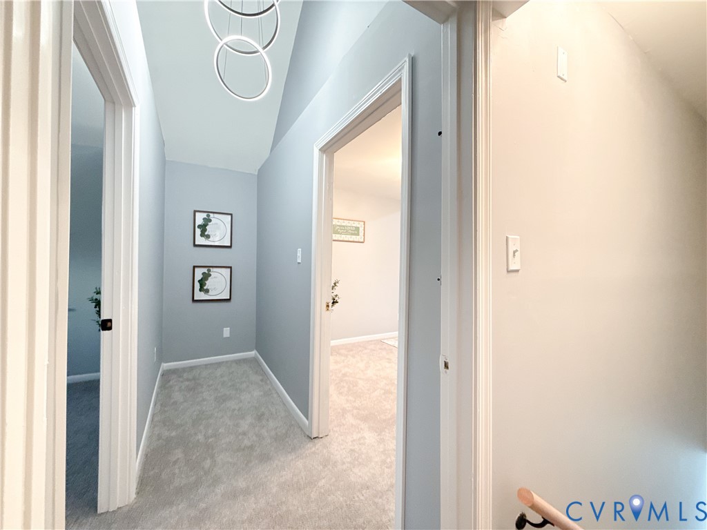 3004 South Ridge Drive Midlothian, VA 23112 - Photo 17 of 35 Hallway featuring light carpet and suspended light