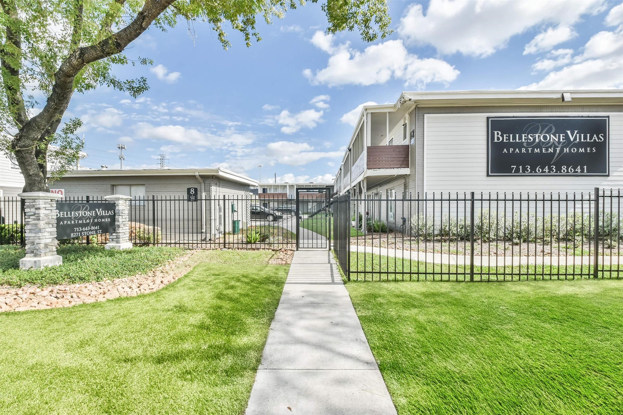 8271 Stone Street, Unit 7509 Houston, TX 77061 - Photo 20 of 21 a view of a house with a garden and pathway