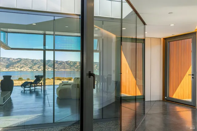 a view of a swimming pool with a lounge chair