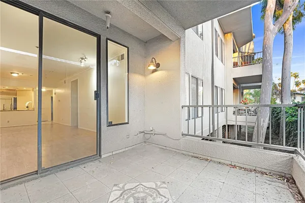 a view of an entryway with a glass door shower
