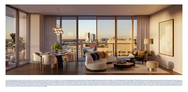 a living room with furniture and large windows