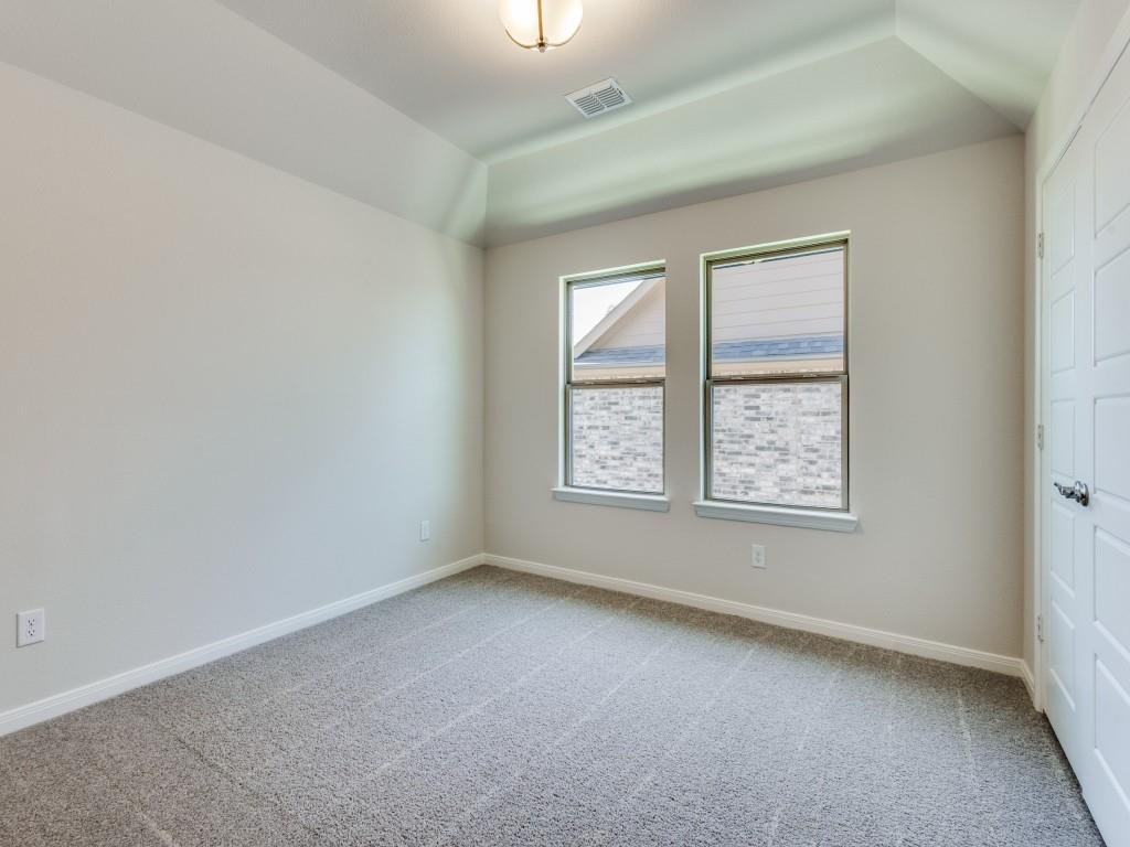 1844 Rosedale Avenue Van Alstyne, TX 75495 - Photo 24 of 24 Our 3207 floor plan offers several nicely sized secondary bedrooms.