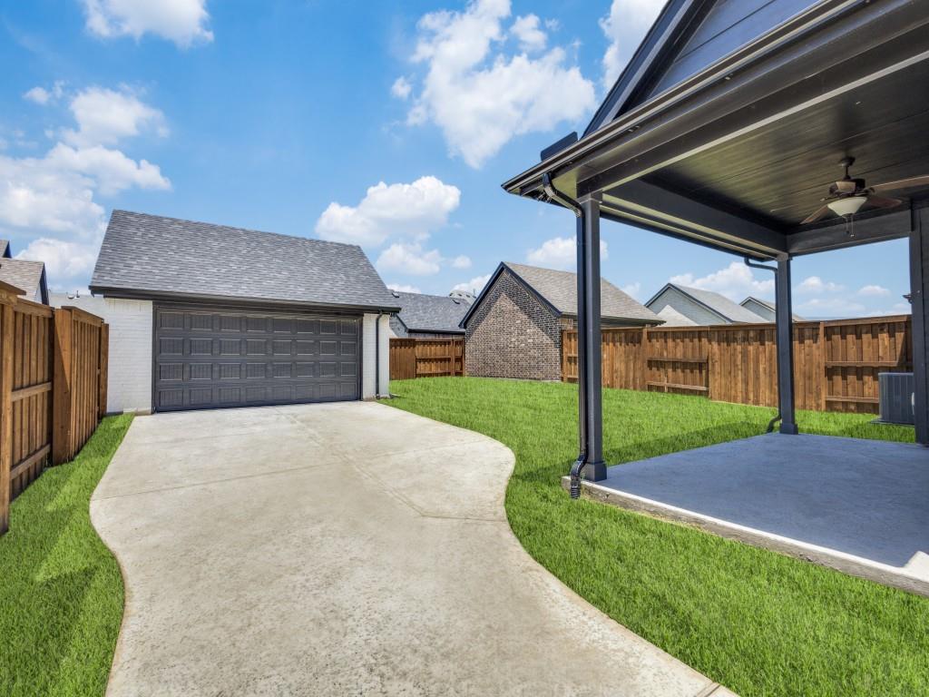1844 Rosedale Avenue Van Alstyne, TX 75495 - Photo 16 of 24 Our 3207 plan offers a great back yard space perfect for family bbq's!