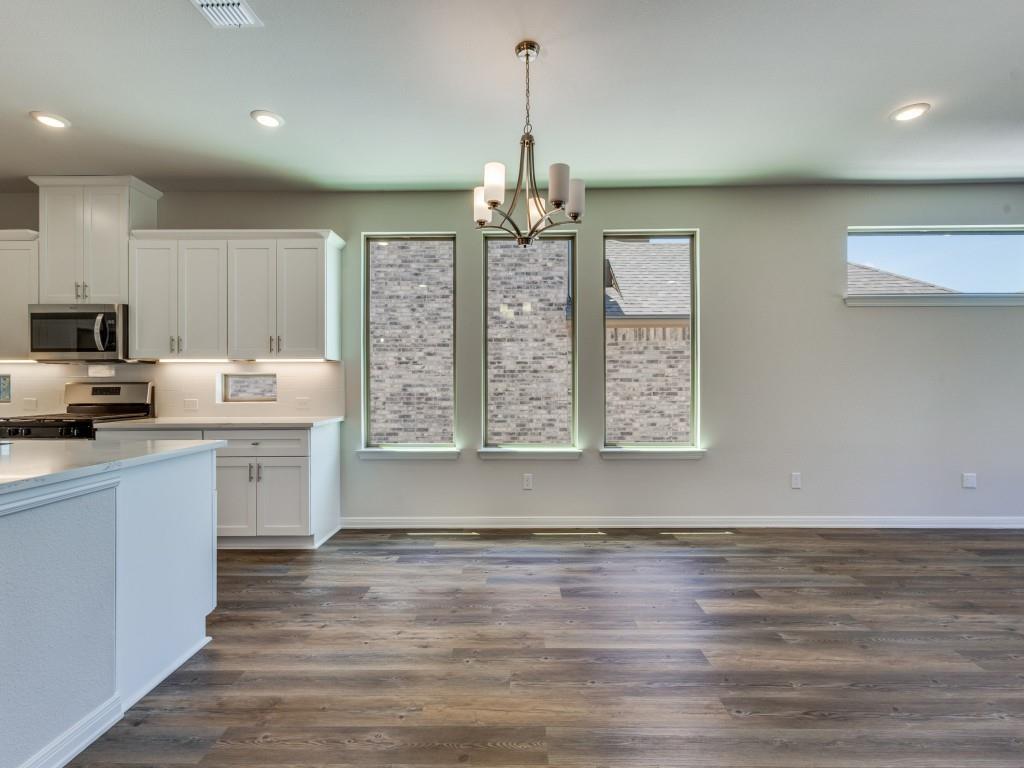 1844 Rosedale Avenue Van Alstyne, TX 75495 - Photo 7 of 24 Adjacent to the kitchen, this lovely dining area is the perfect place for cozy family meals or fun dinner parties!