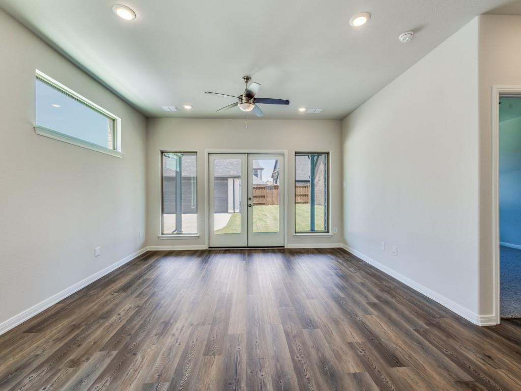 1844 Rosedale Avenue Van Alstyne, TX 75495 - Photo 8 of 24 With a wall of windows looking out to your back yard, this family room offers a warm and inviting place to gather.