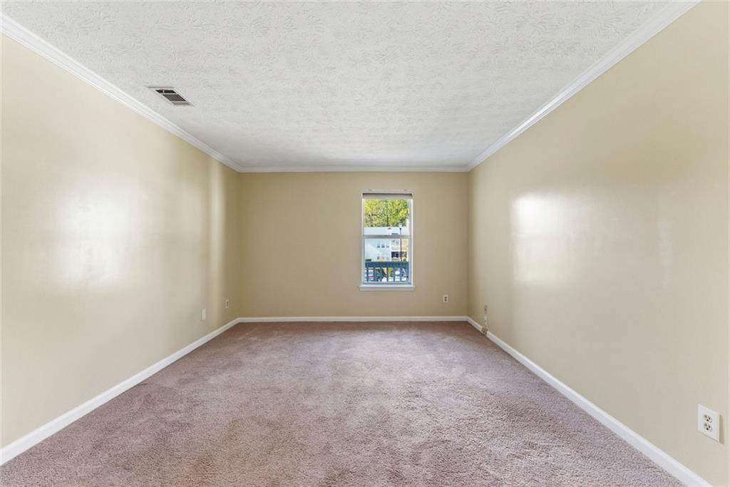 2043 Brian Way Decatur, GA 30033 - Photo 13 of 25 an empty room with windows