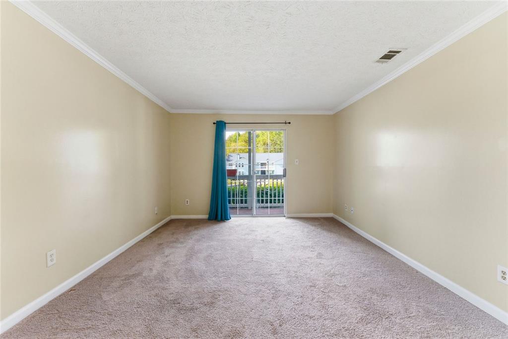 2043 Brian Way Decatur, GA 30033 - Photo 17 of 25 a view of an empty room with window
