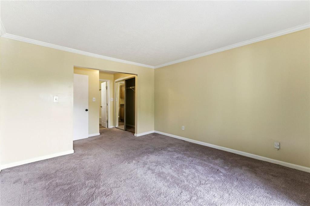 2043 Brian Way Decatur, GA 30033 - Photo 18 of 25 a view of an empty room with a window