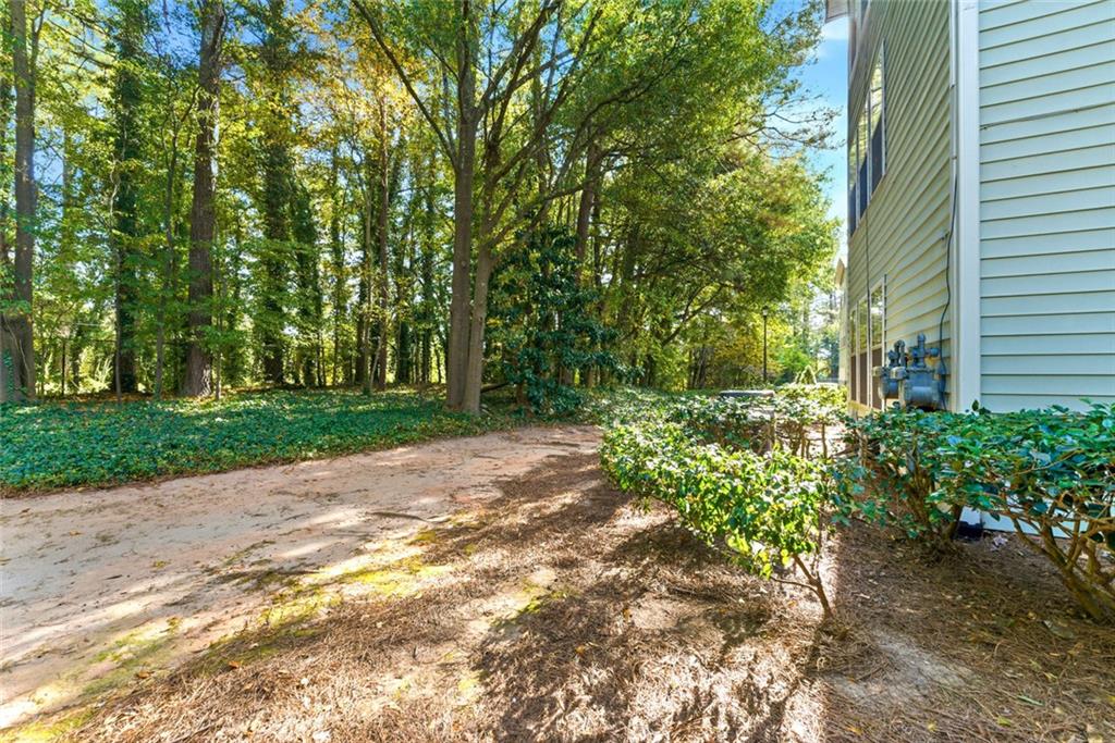 2043 Brian Way Decatur, GA 30033 - Photo 24 of 25 a backyard of a house with lots of green space