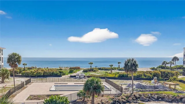 a view of a swimming pool and an ocean