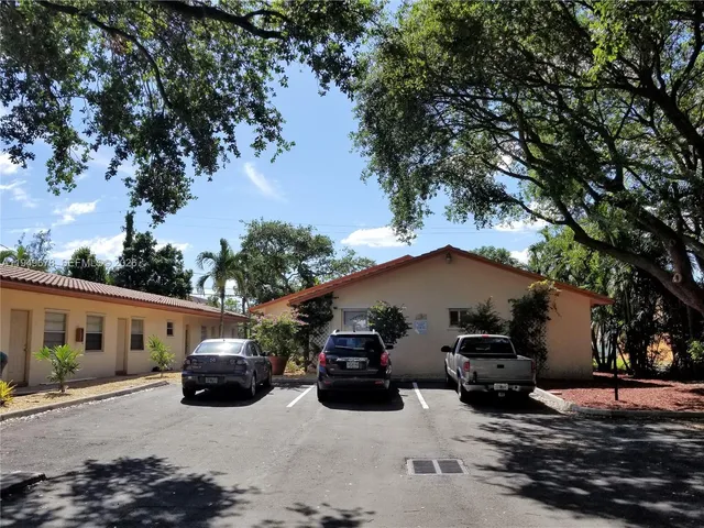 a car parked in front of a house