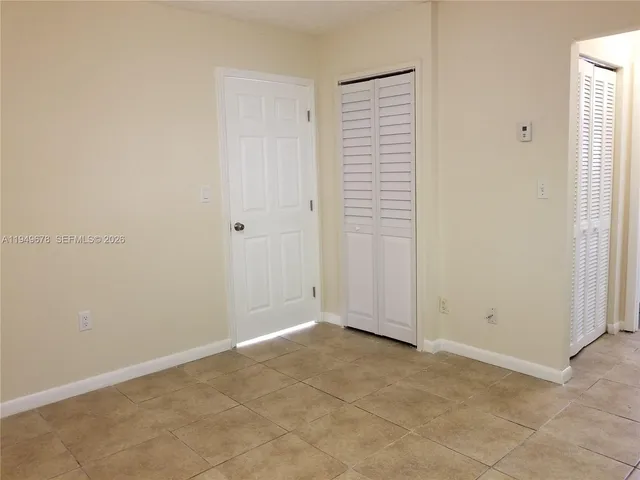an empty room with closet