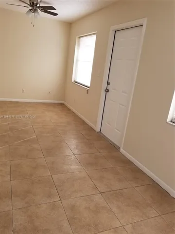 a bathroom with a sink a mirror and a bathtub