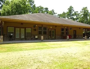 a view of pool with outdoor seating