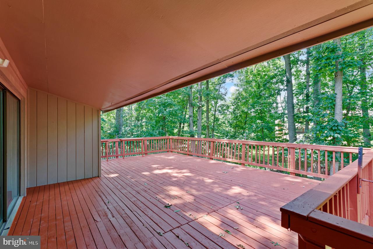 1404 Wolftrap Run Road Vienna, VA 22182 - Photo 15 of 33 Large deck overlooking spacious backyard