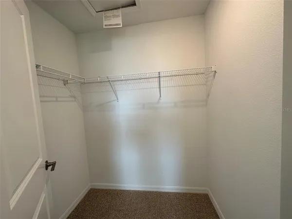 a view of small space with racks on the wall