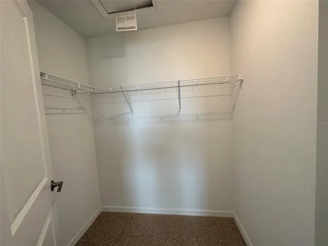 a view of small space with racks on the wall