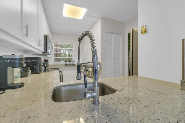 $205,000 | 9410 Poinciana Place, Unit 206, Davie, FL 33324