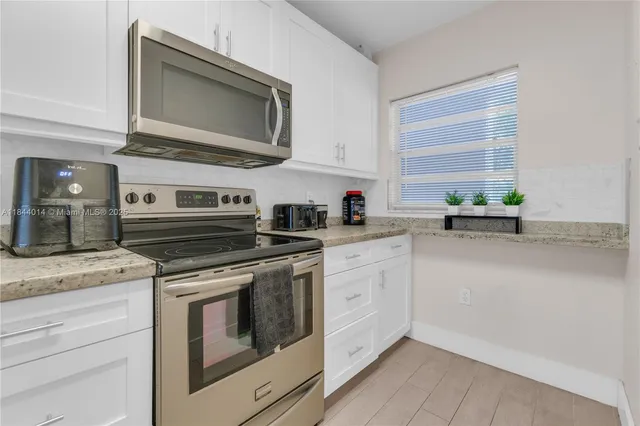 $205,000 | 9410 Poinciana Place, Unit 206, Davie, FL 33324