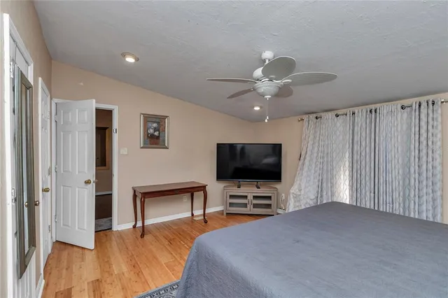 a bathroom with a sink a toilet and bathtub
