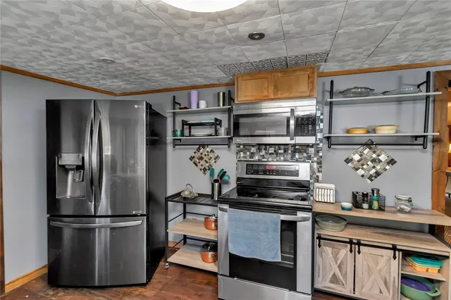 a bedroom with a bed and a table