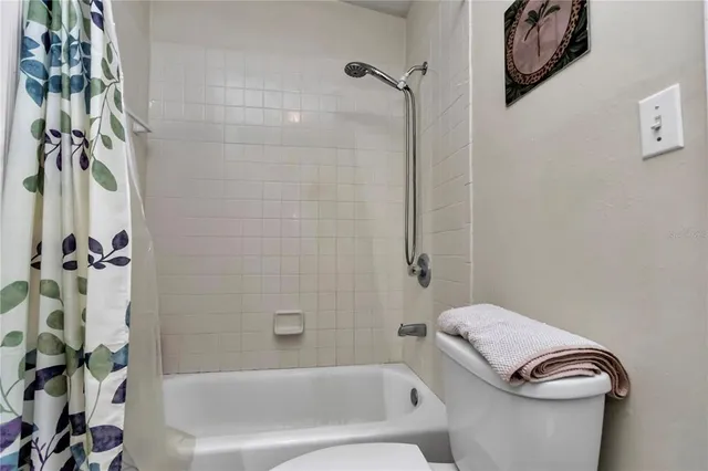 a room with furniture and a rug