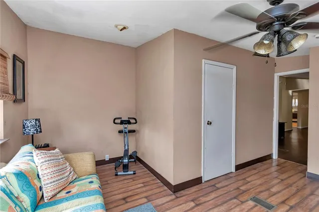 a view of a playground with basketball court