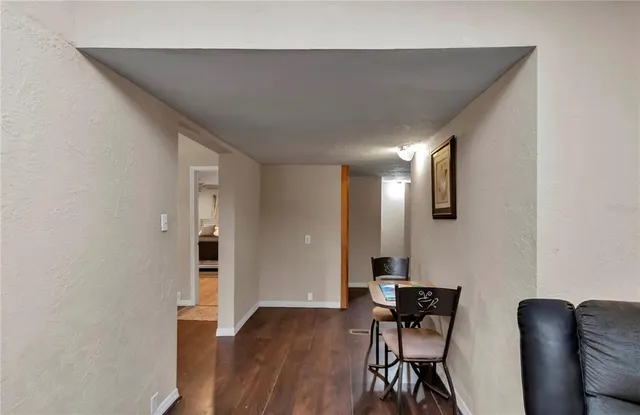 a view of yard with swimming pool and trees