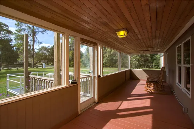 a view of swimming pool with a patio