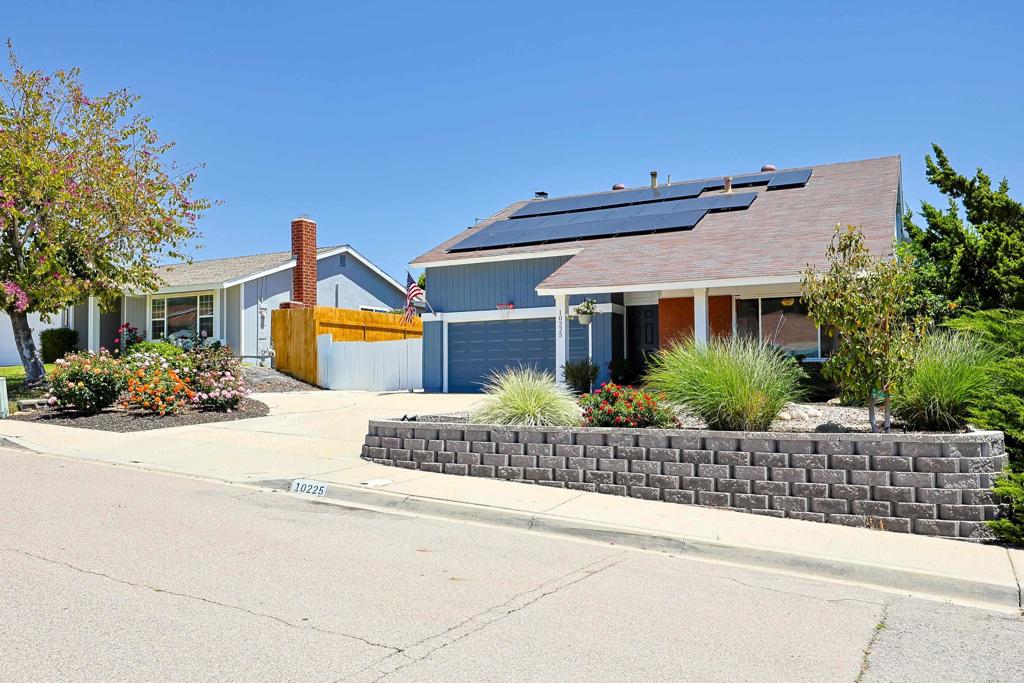front view of a house with a small yard