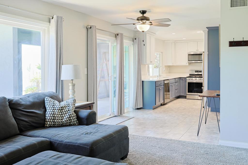 10225 Molino Road Santee, CA 92071 - Photo 19 of 53 a living room with furniture and a chandelier