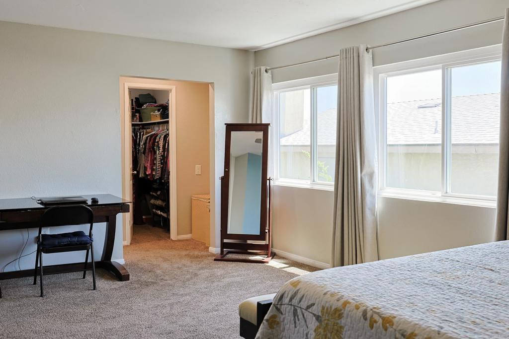 10225 Molino Road Santee, CA 92071 - Photo 23 of 53 a bedroom with a bed and a window