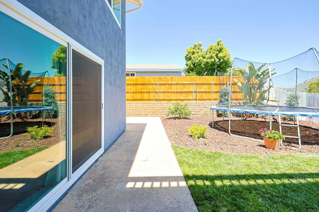 10225 Molino Road Santee, CA 92071 - Photo 43 of 53 a view of a swimming pool with a lounge chairs