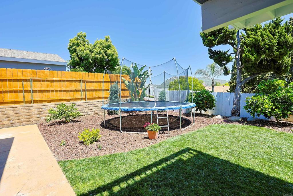 10225 Molino Road Santee, CA 92071 - Photo 44 of 53 a view of a swimming pool with a patio