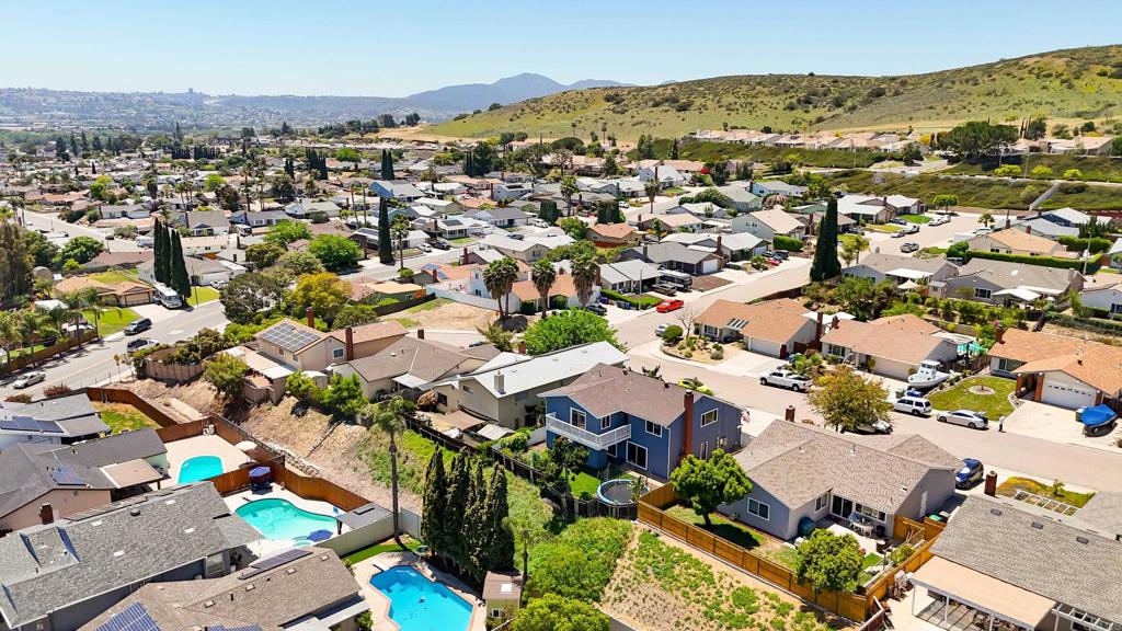 10225 Molino Road Santee, CA 92071 - Photo 53 of 53 an aerial view of residential houses with outdoor space