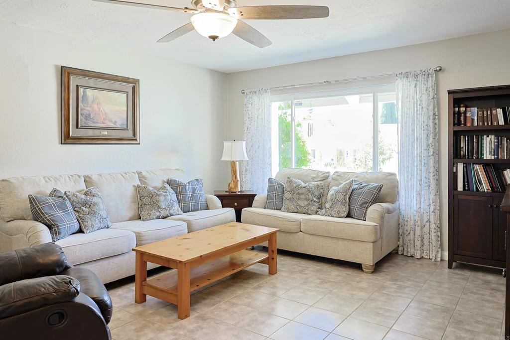 10225 Molino Road Santee, CA 92071 - Photo 7 of 53 a living room with furniture and a large window