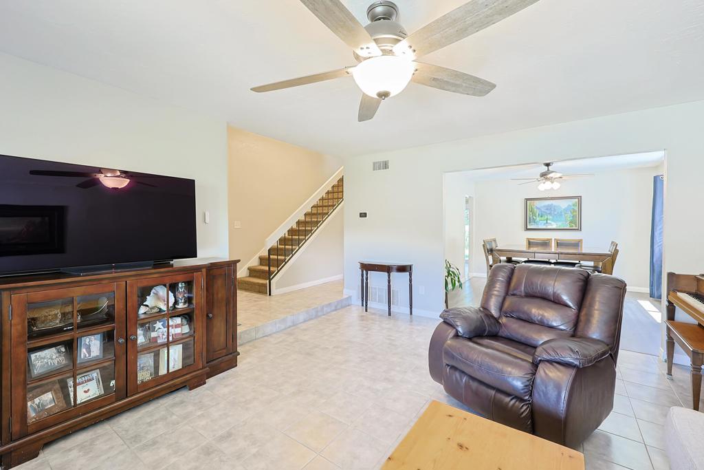 10225 Molino Road Santee, CA 92071 - Photo 9 of 53 a living room with furniture and a flat screen tv
