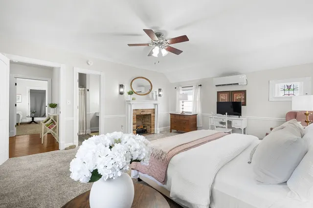 a living room with furniture rug and window