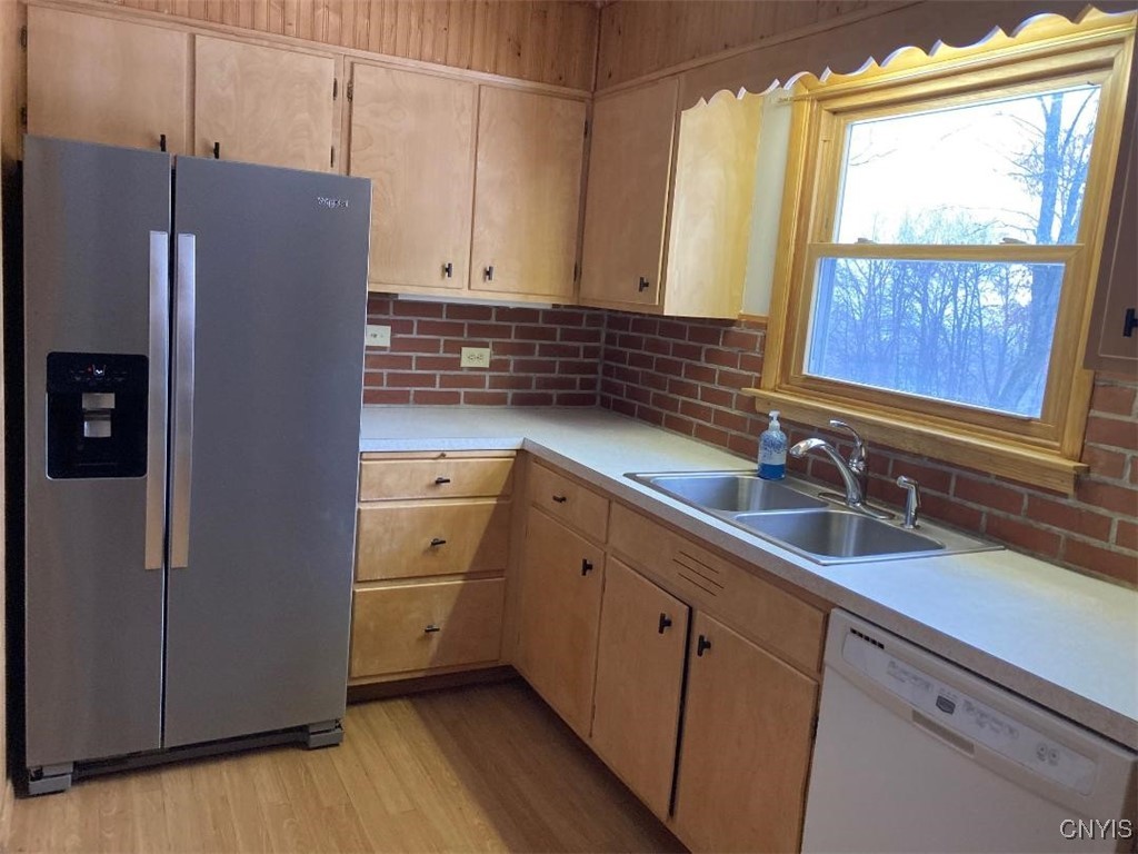 5758 Hamilton Road Elbridge, NY 13080 - Photo 15 of 27 The kitchen is compact, but the window allows a vi