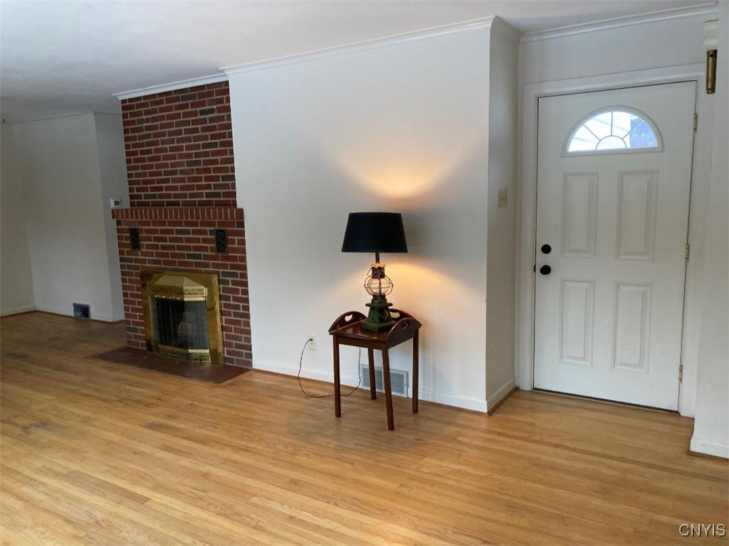 5758 Hamilton Road Elbridge, NY 13080 - Photo 19 of 27 The fireplace is wood-burning, the hardwoods are t