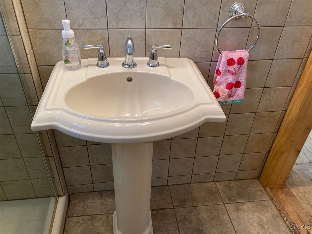 5758 Hamilton Road Elbridge, NY 13080 - Photo 21 of 27 A pedestal sink was also added.