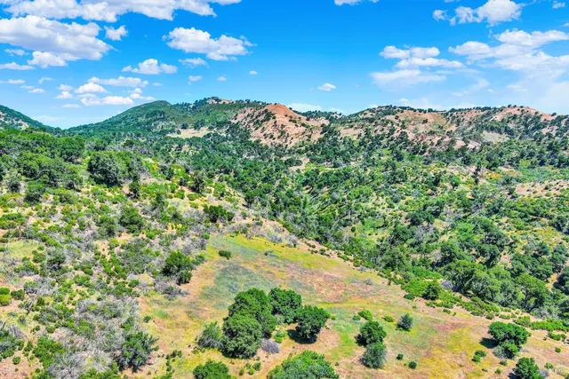 a view of a lake with a city