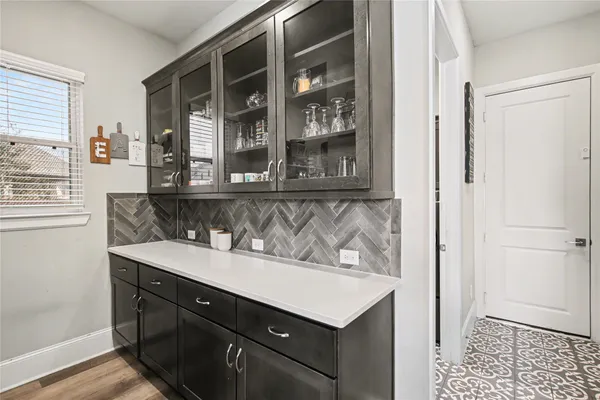 a view of cabinets and window