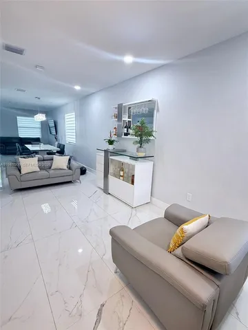 a living room with furniture