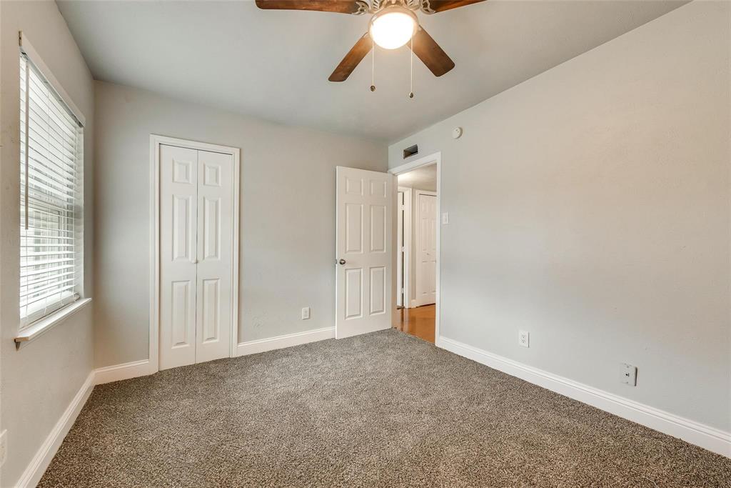 5220 Arbor Glen Road The Colony, TX 75056 - Photo 17 of 29 a view of an empty room with a window